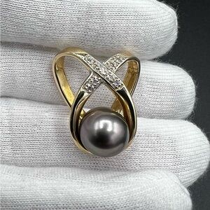 Vintage Black Tahitian Pearl and Diamond Enhancer/Pendant set in 14K Gold.